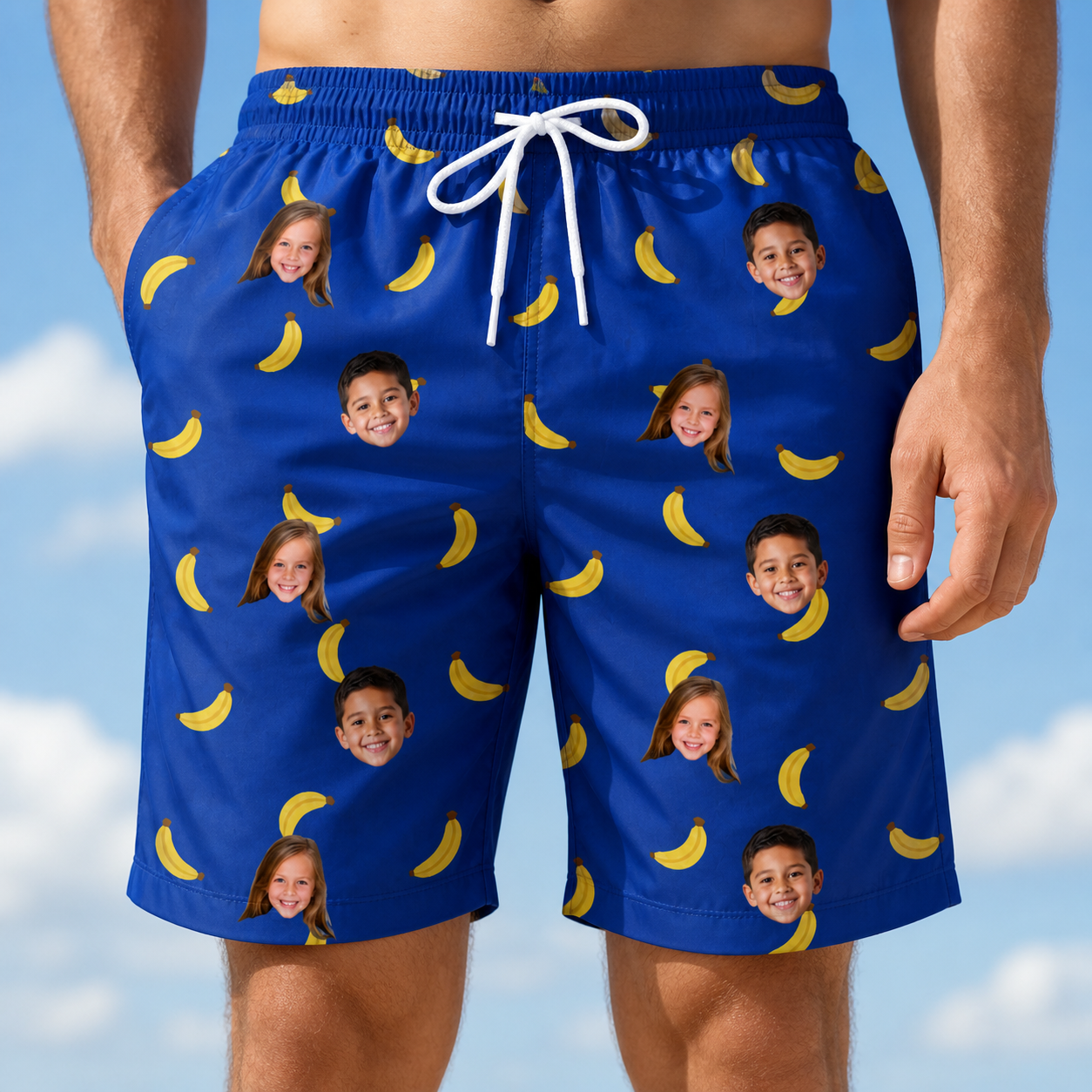 Model wearing Men's Bunch Buzz Custom Face Beach Shorts printed with kids' faces