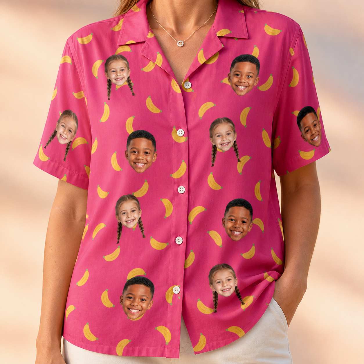Model wearing Women's Banana Bonanza Custom Face Hawaiian Shirt printed with kids' faces
