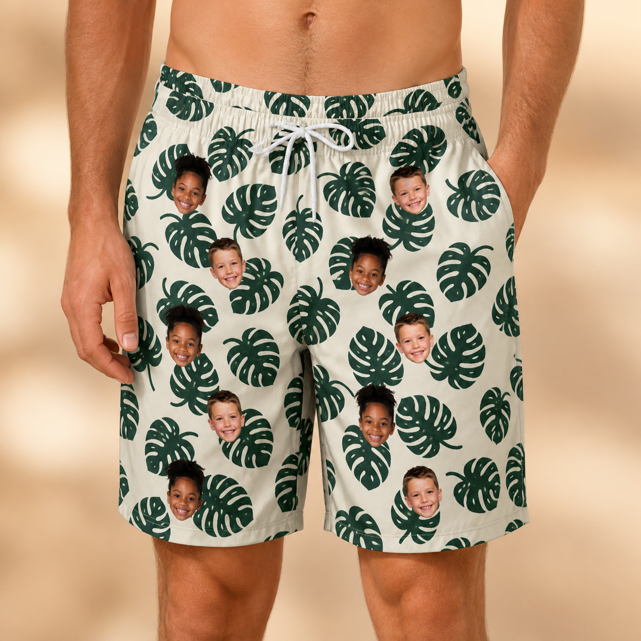 Model wearing Men's Verdant Vacation Custom Face Beach Shorts printed with kids' faces