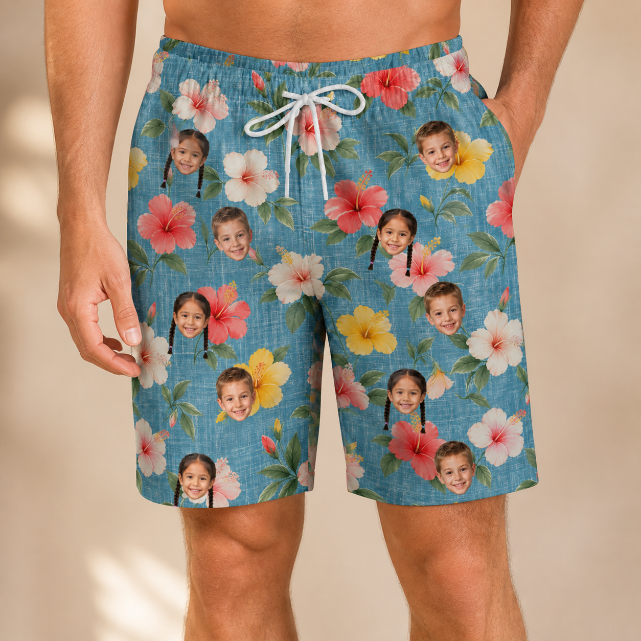 Model wearing Men's Petal Party Custom Face Beach Shorts printed with kids' faces