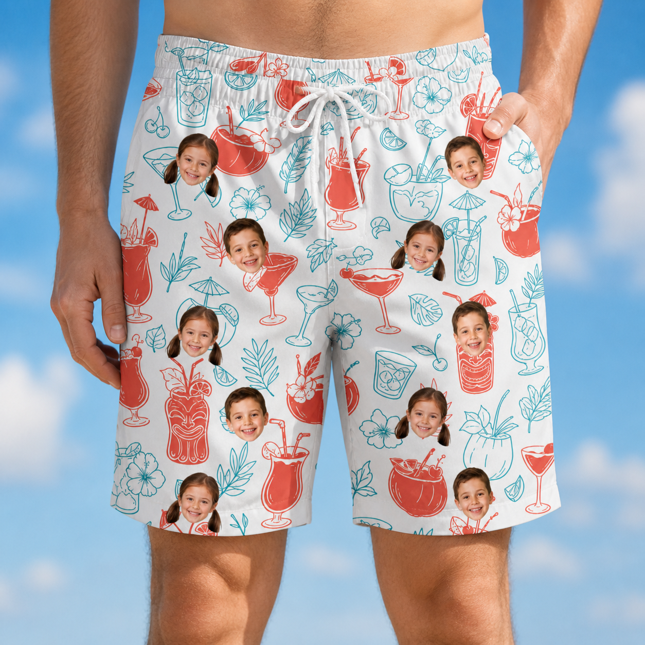 Model wearing Men's Engaged Elixirs Custom Face Beach Shorts printed with kids' faces