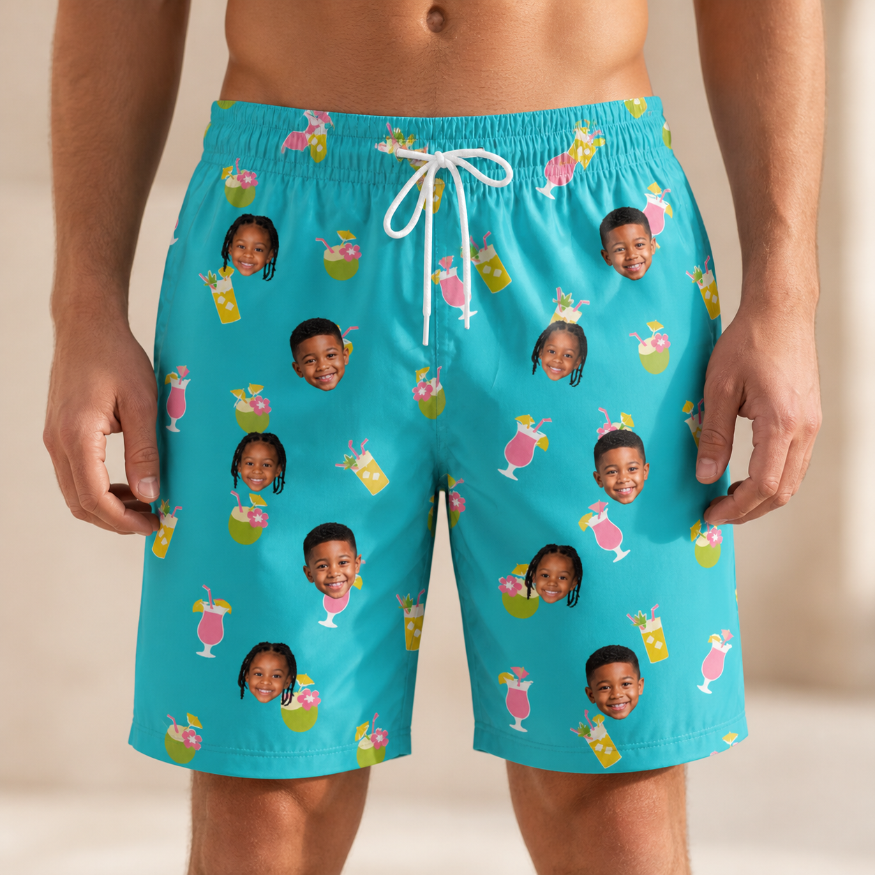 Model wearing Men's Daiquiri Darlings Custom Face Beach Shorts printed with kids' faces