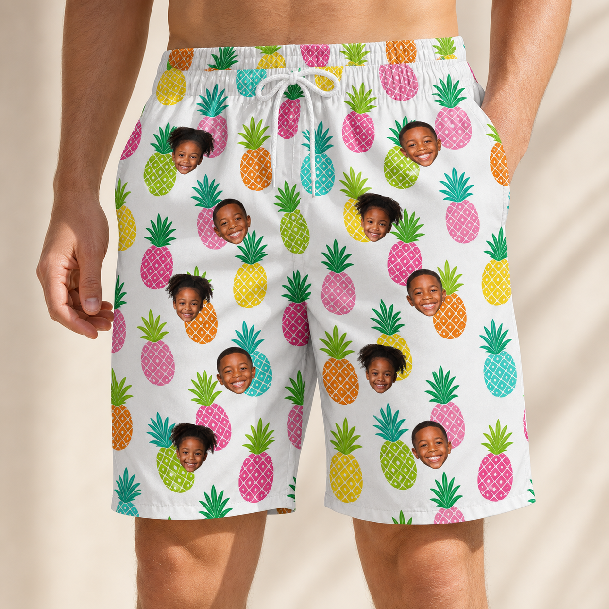 Model wearing Men's Poolside Pips Custom Face Beach Shorts printed with kids' faces