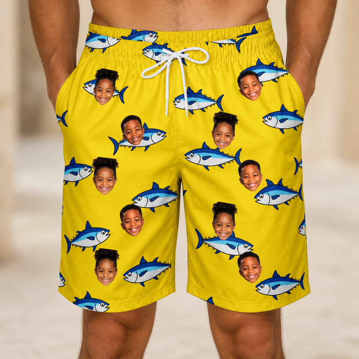 Model wearing Men's Bluefin Banter Custom Face Beach Shorts printed with kids' faces