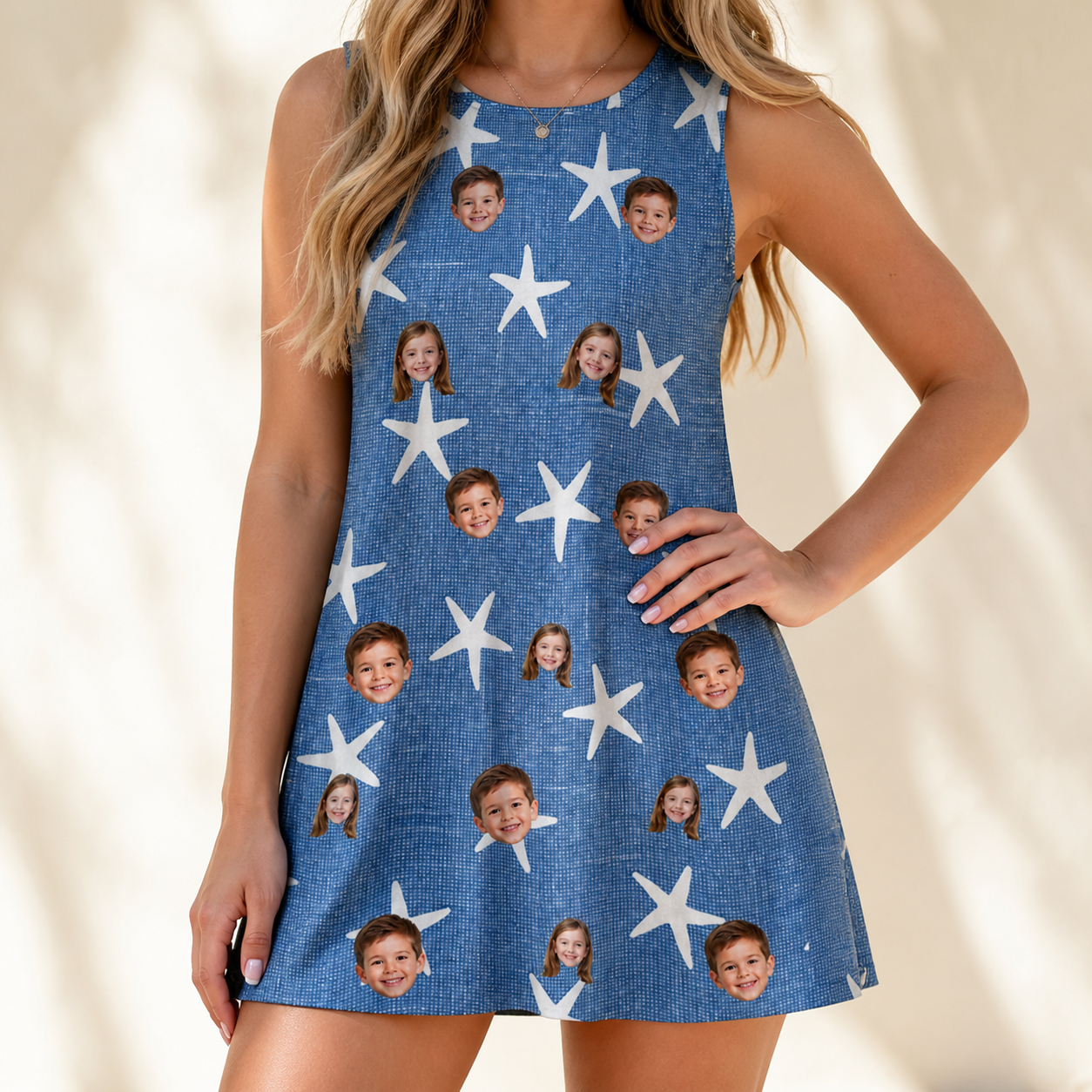 Model wearing Women's Starfish Swerve Custom Face Tank Dress printed with kids' faces