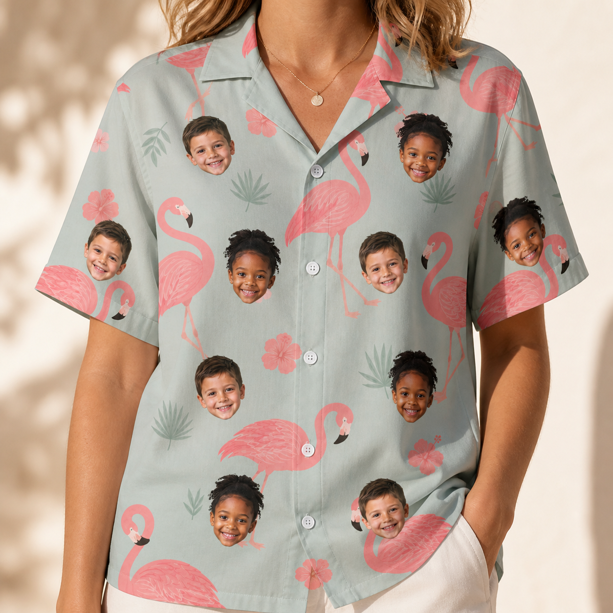 Model wearing Women's Salmon Soiree Custom Face Hawaiian Shirt printed with kids' faces