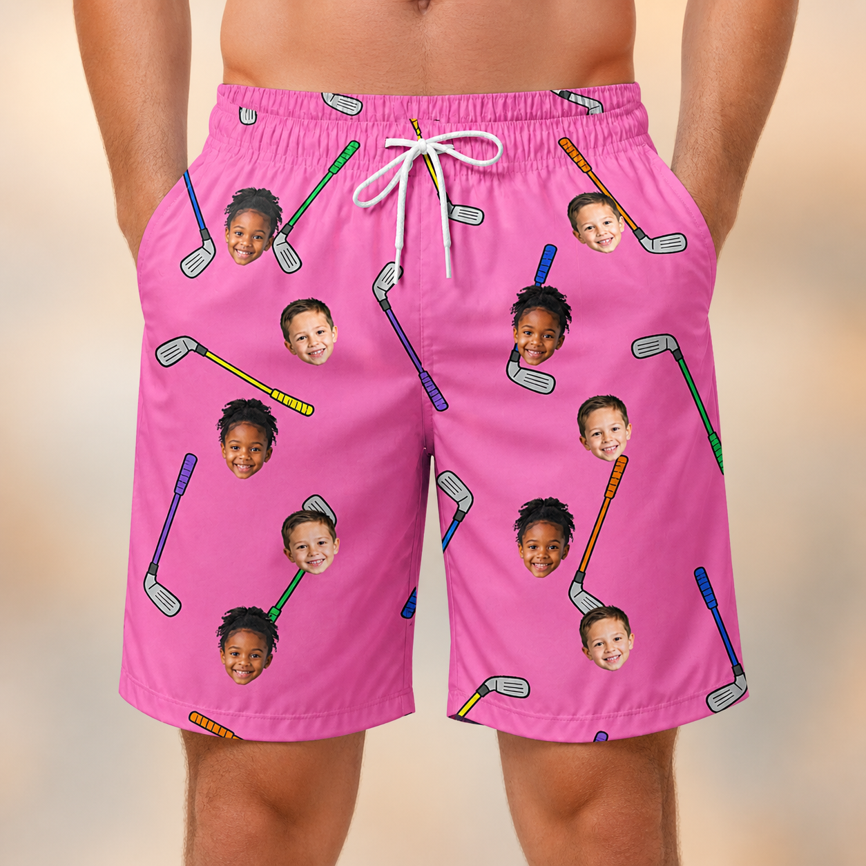 Model wearing Men's Loft Legends Custom Face Beach Shorts printed with kids' faces