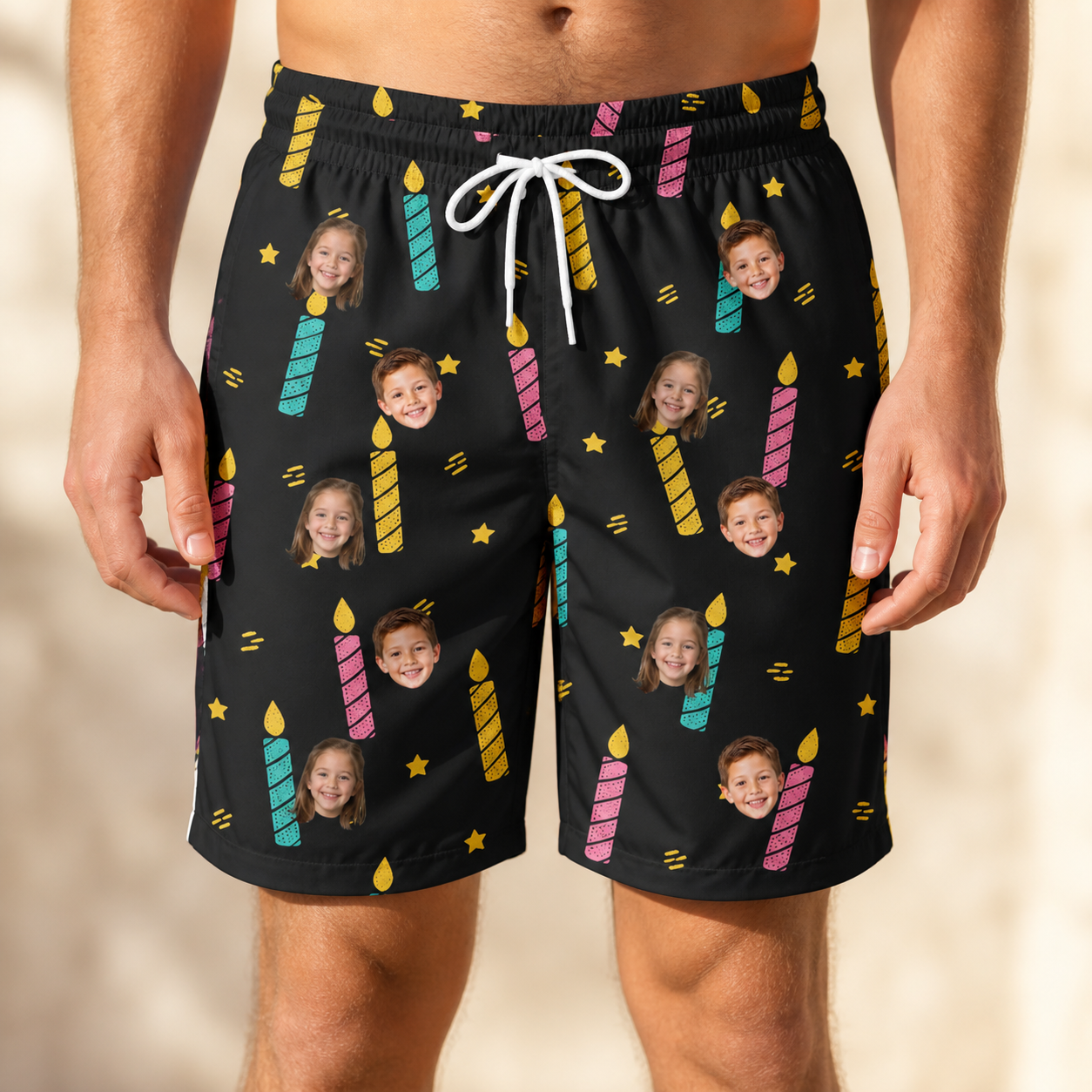 Model wearing Men's Wick Winks Custom Face Beach Shorts printed with kids' faces