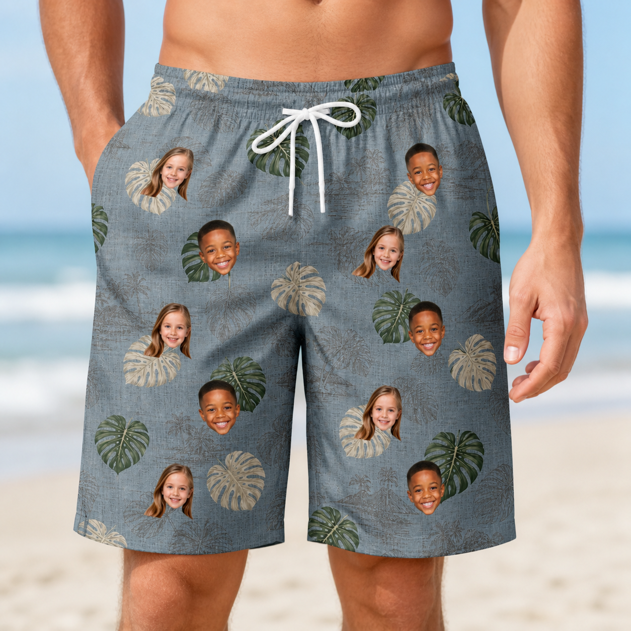 Model wearing Men's Monstera Mingle Custom Face Beach Shorts printed with kids' faces