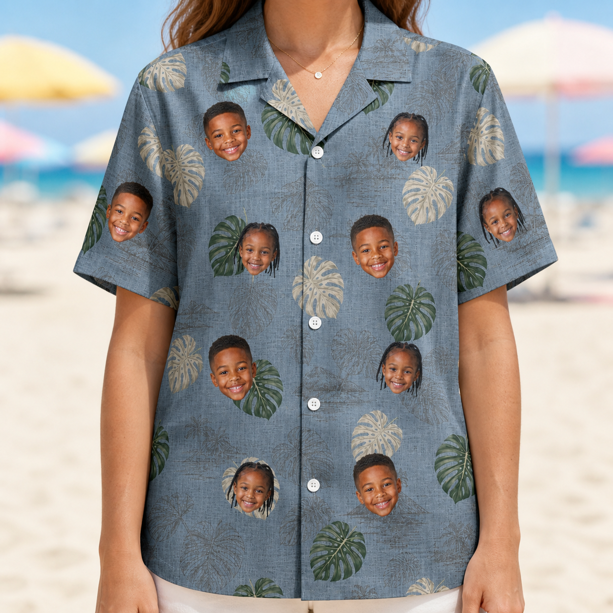 Model wearing Women's Monstera Mingle Custom Face Hawaiian Shirt printed with kids' faces