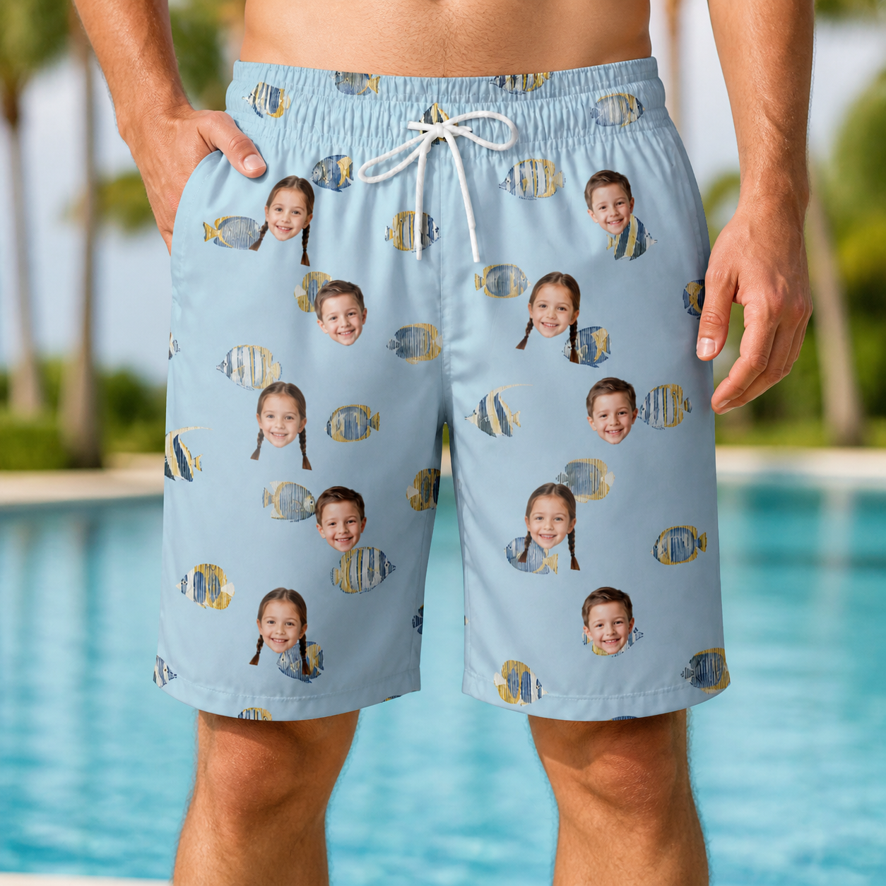 Model wearing Men's Aquatic Antics Custom Face Beach Shorts printed with kids' faces