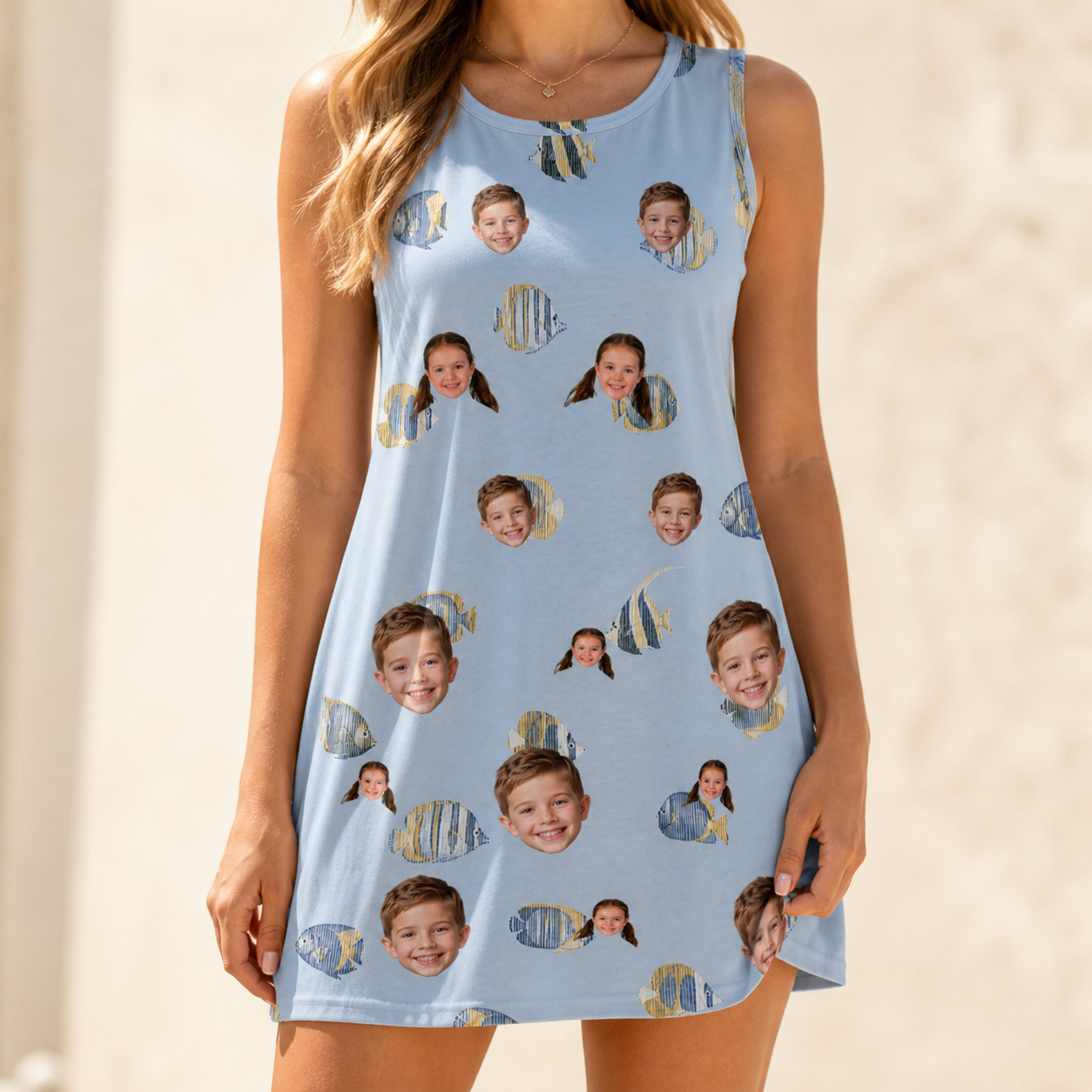 Model wearing Women's Aquatic Antics Custom Face Tank Dress printed with kids' faces