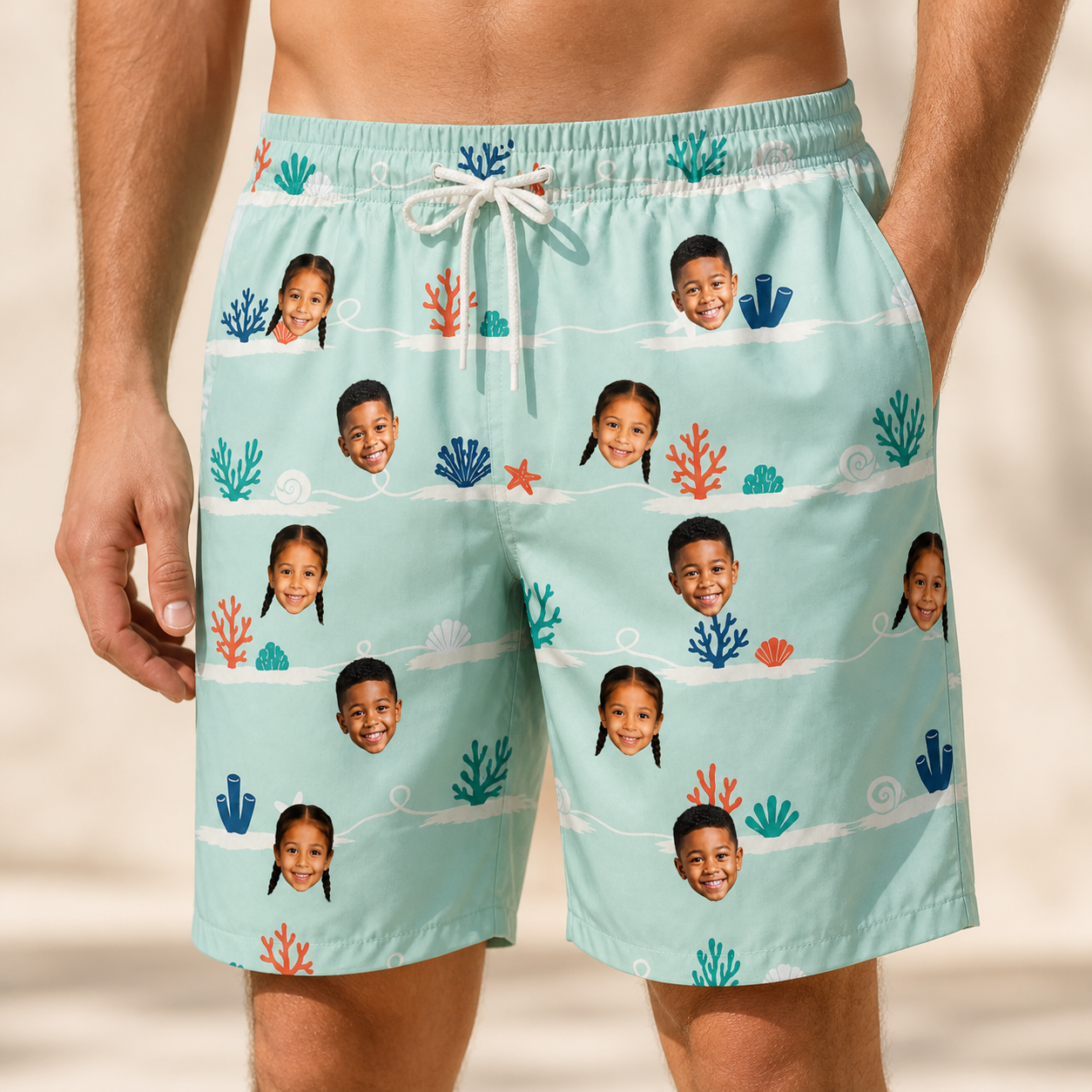 Model wearing Men's Coral Current Custom Face Beach Shorts printed with kids' faces