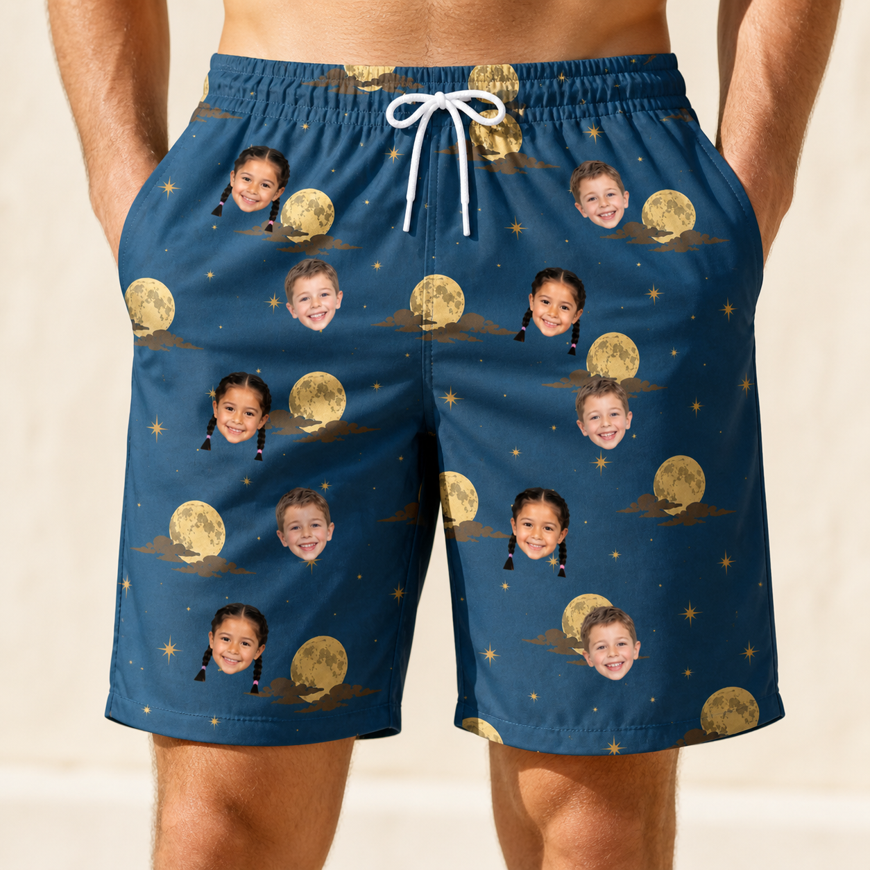 Model wearing Men's Lunar Laughs Custom Face Beach Shorts printed with kids' faces