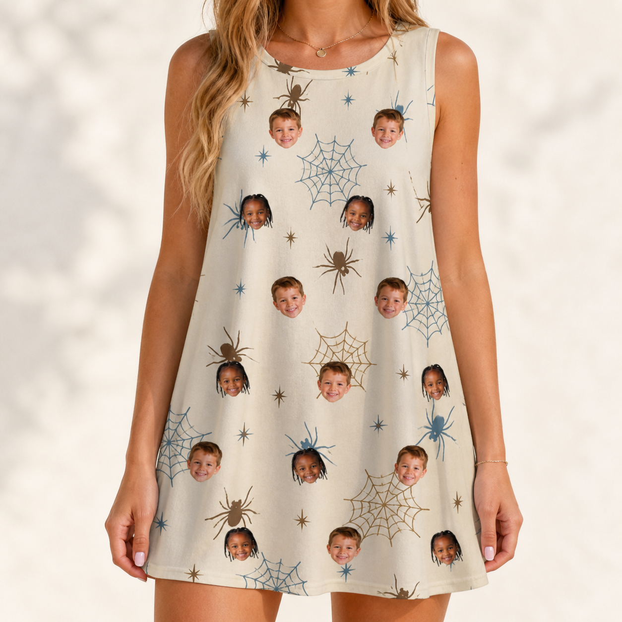 Model wearing Women's Macabre Mesh Custom Face Tank Dress printed with kids' faces