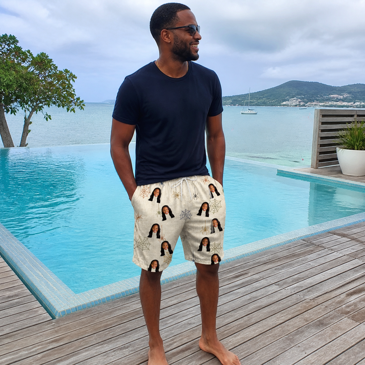 Real-life photo of someone wearing Men's Gossamer Ghouls Custom Face Beach Shorts — custom faces printed all-over