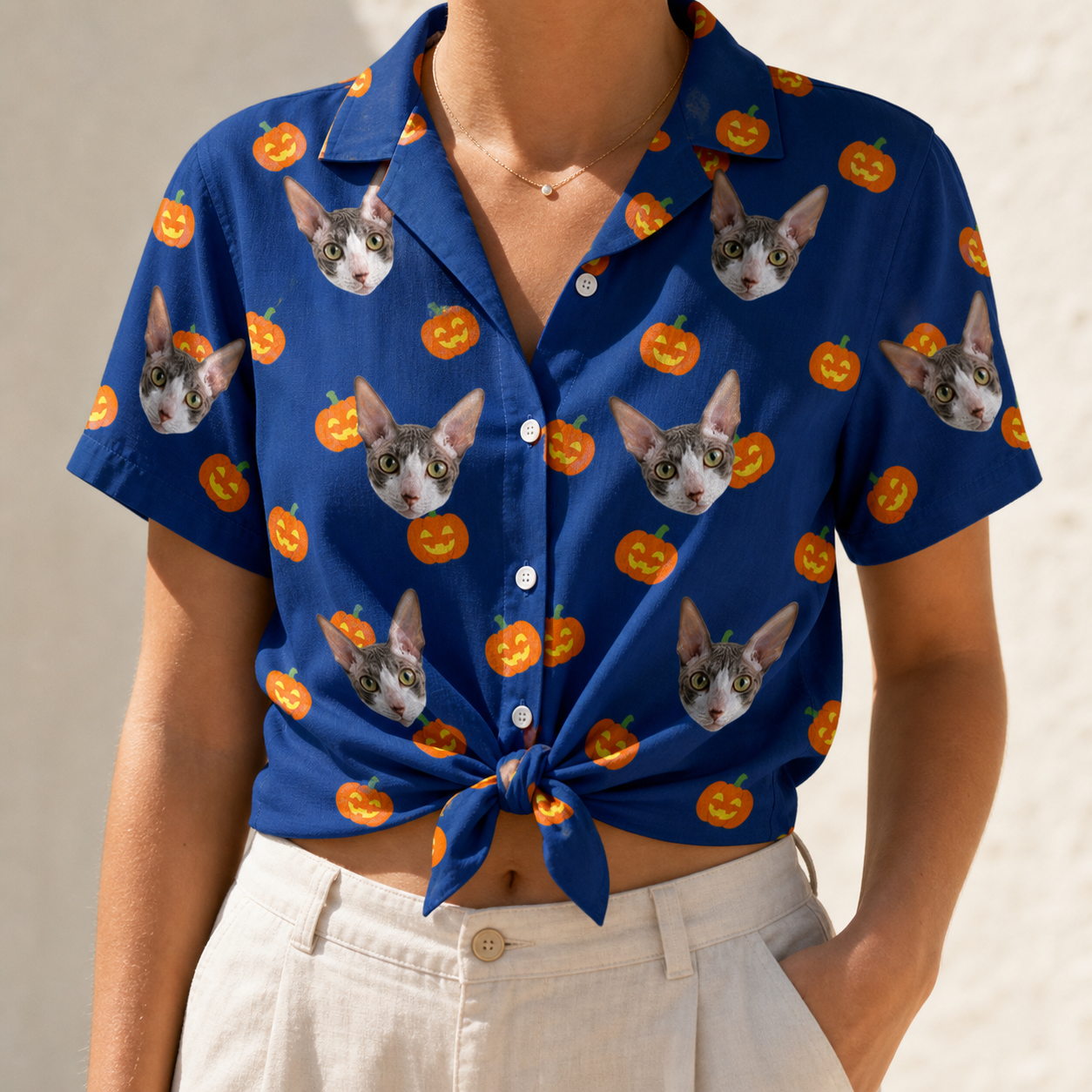 Woman wearing Women's Orange Oddities Custom Cat Face Hawaiian Shirt tied at the waist
