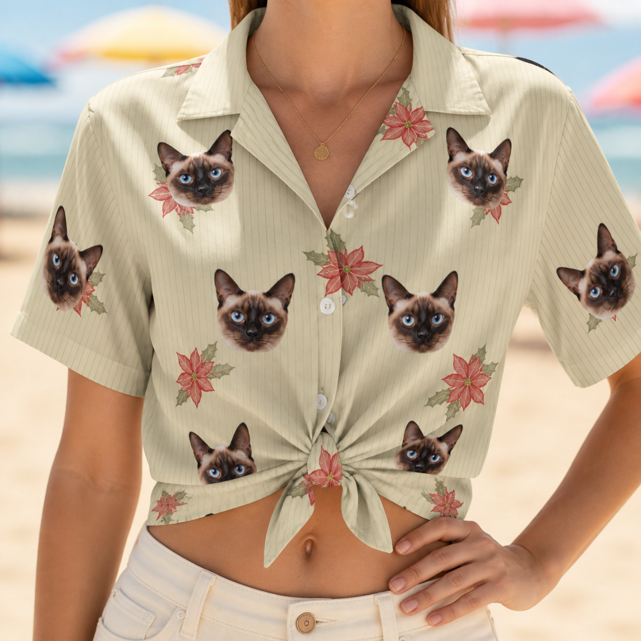 Woman wearing Women's Poinsettia Pop Custom Cat Face Hawaiian Shirt tied at the waist