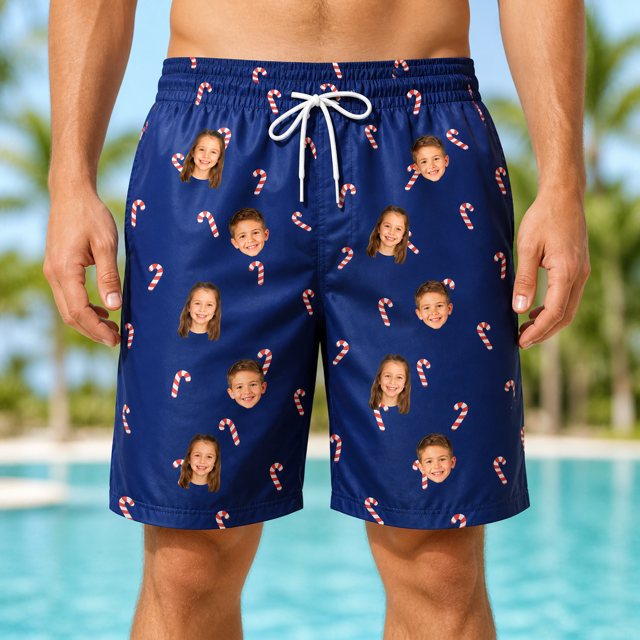 Model wearing Men's Peppermint Pizzazz Custom Face Beach Shorts printed with kids' faces