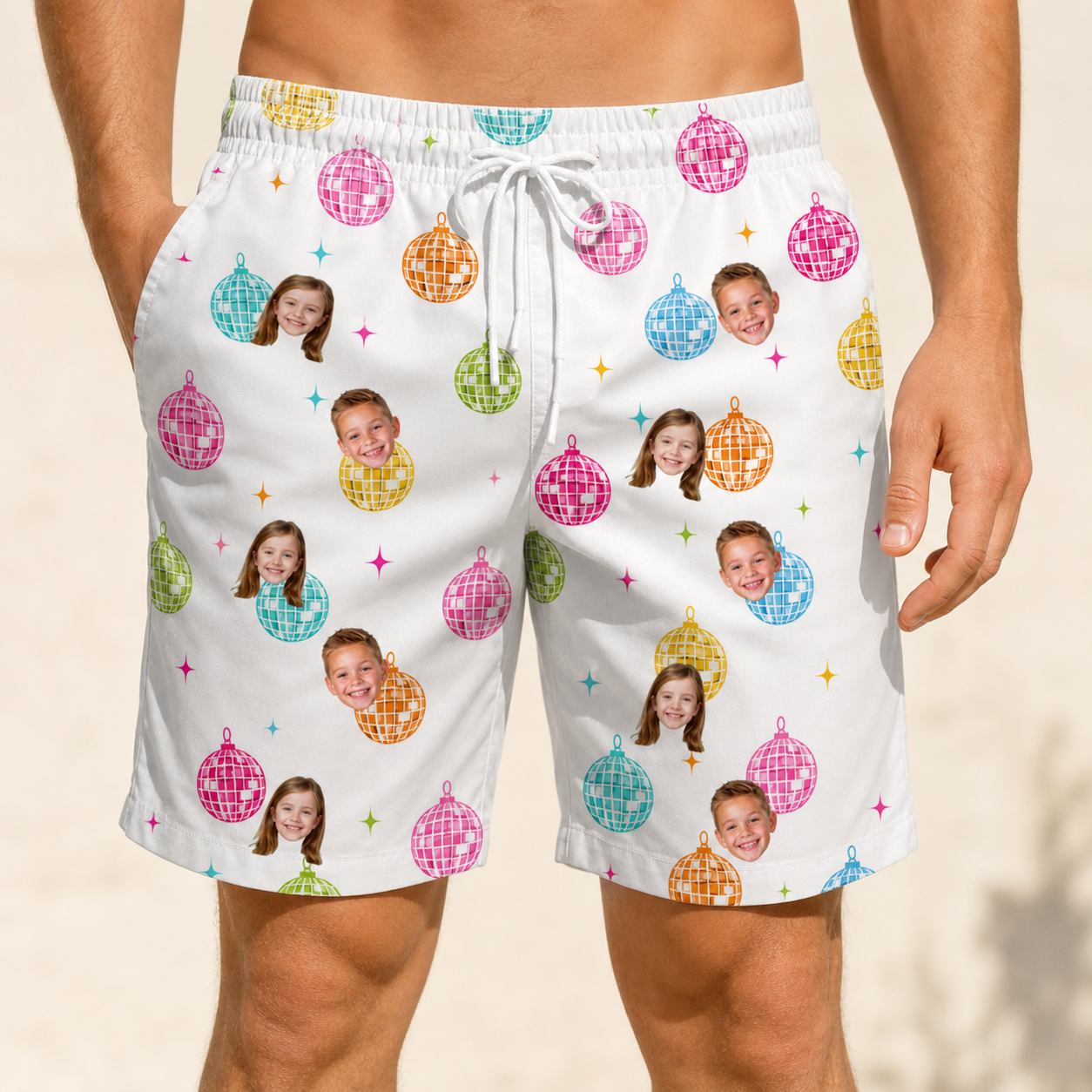 Model wearing Men's Disco Darling Custom Face Beach Shorts printed with kids' faces