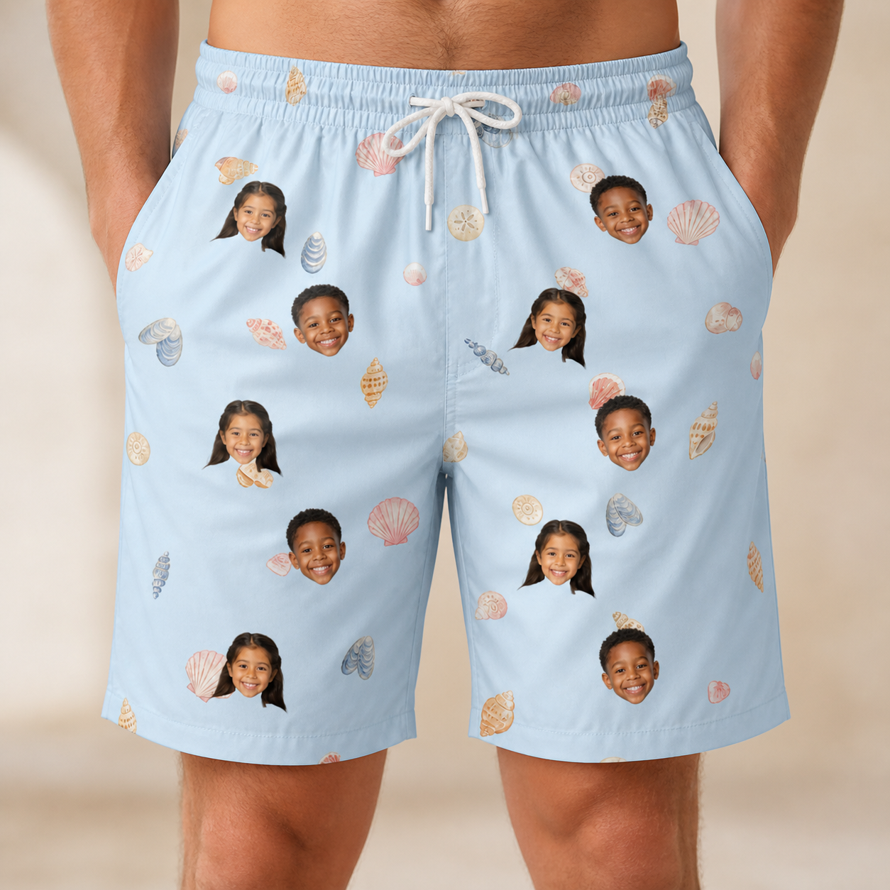 Model wearing Men's Shell Yeah Custom Face Beach Shorts printed with kids' faces