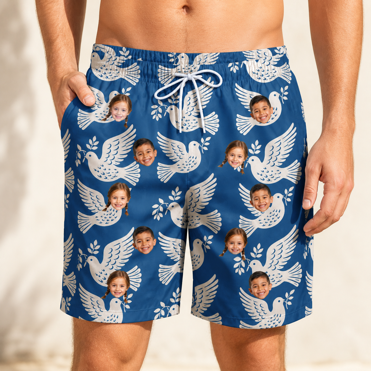 Model wearing Men's Pearlwing Promise Custom Face Beach Shorts printed with kids' faces