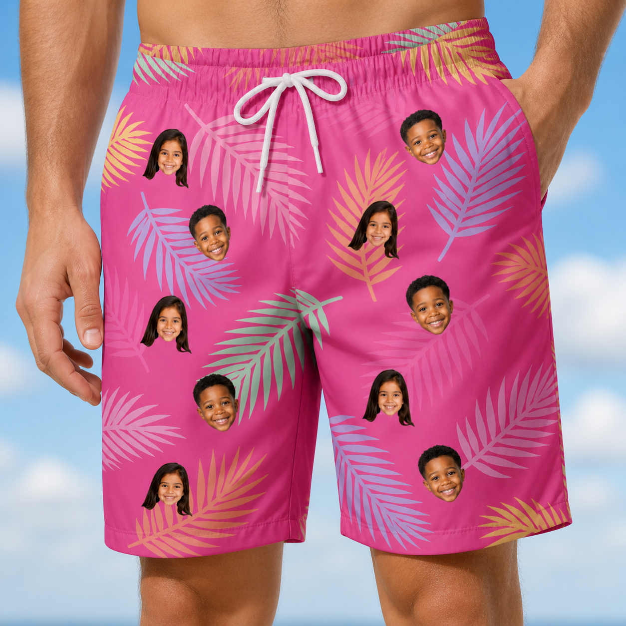 Model wearing Men's Swaying Sweethearts Custom Face Beach Shorts printed with kids' faces