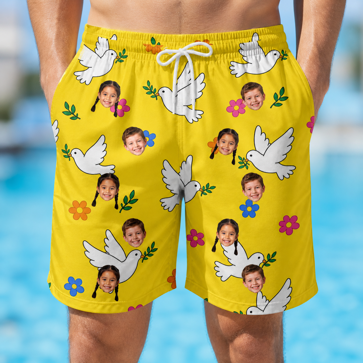Model wearing Men's Dovebound Daydream Custom Face Beach Shorts printed with kids' faces