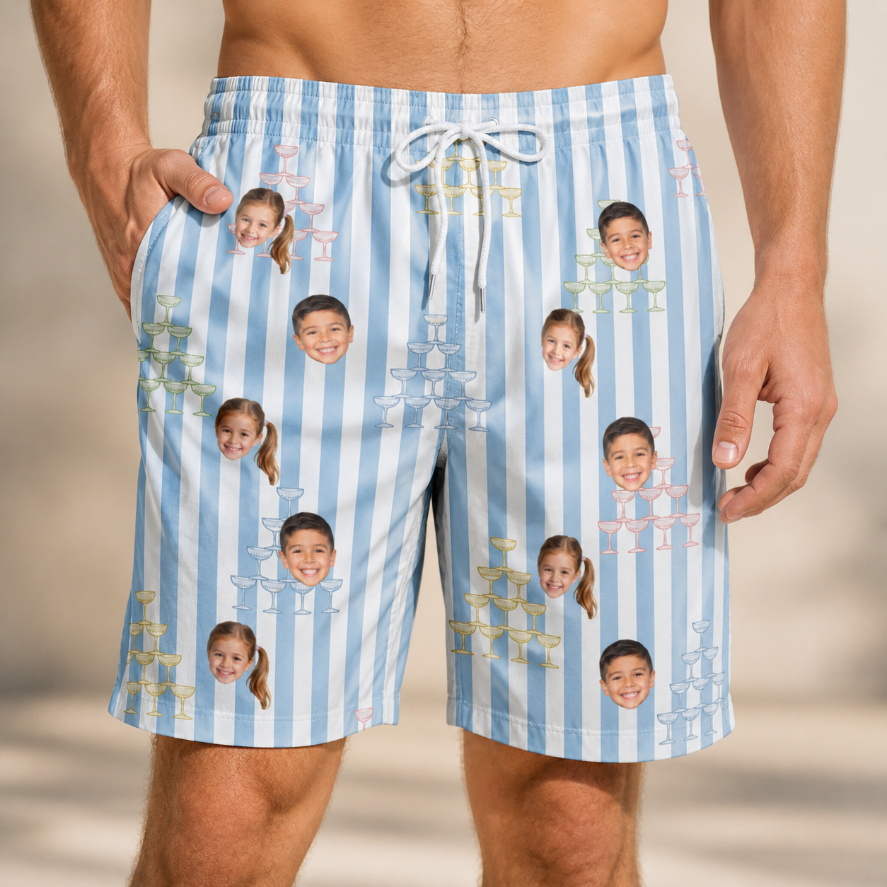 Model wearing Men's Fizz Towers Custom Face Beach Shorts printed with kids' faces