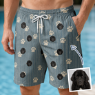Man wearing Men's Muzzle Marks Custom Dog Face Beach Shorts — custom faces printed all-over