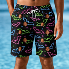Model wearing Men's Batty Night Custom Face Beach Shorts printed with kids' faces