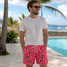 Real-life photo of someone wearing Men's Banana Bonanza Custom Face Beach Shorts — custom faces printed all-over
