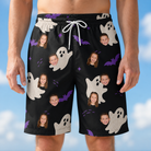 Model wearing Men's Boo Bats Custom Face Beach Shorts printed with kids' faces