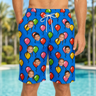 Model wearing Men's Balloon Scribbles Custom Face Beach Shorts printed with kids' faces