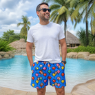 Real-life photo of someone wearing Men's Balloon Scribbles Custom Face Beach Shorts — custom faces printed all-over