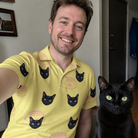 Selfie with the pet whose face is printed all over this Men's Whisker Buffet Custom Cat Face Polo Shirt