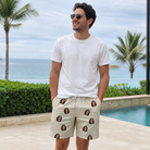 Real-life photo of someone wearing Men's Kin Kicks Custom Face Beach Shorts — custom faces printed all-over