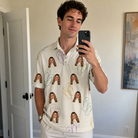 Real-life photo of someone wearing Men's Kin Kicks Custom Face Polo Shirt — custom faces printed all-over