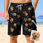 Man wearing Men's Bark Buckles Custom Dog Face Beach Shorts — custom faces printed all-over