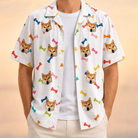 Man wearing Men's Gnawvana Grove Custom Dog Face Hawaiian Shirt open over a white tee