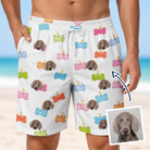 Man wearing Men's Tag Wag Custom Dog Face Beach Shorts — custom faces printed all-over