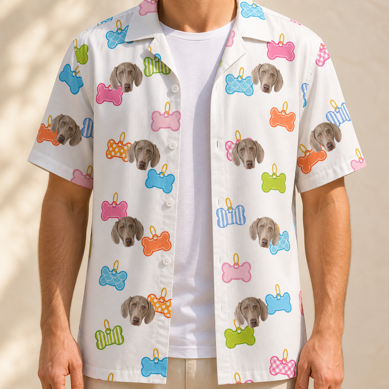 Man wearing Men's Tag Wag Custom Dog Face Hawaiian Shirt open over a white tee