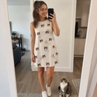 Full-length photo with the pet printed all over this Women's Skein Snoopers Custom Cat Face Tank Dress