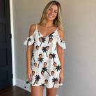 Real-life photo of someone wearing Women's Ylang Ylang Custom Face Off-Shoulder Dress — custom faces printed all-over