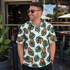 Real-life photo of someone wearing Men's Verdant Vacation Custom Face Polo Shirt — custom faces printed all-over