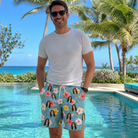 Real-life photo of someone wearing Men's Petal Party Custom Face Beach Shorts — custom faces printed all-over