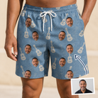 Man wearing Men's Gardenia Grooves Custom Face Beach Shorts — custom faces printed all-over