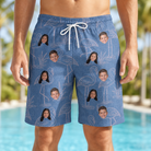 Model wearing Men's Neck Appeal Custom Face Beach Shorts printed with kids' faces