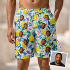 Man wearing Men's Citron Confetti Custom Face Beach Shorts — custom faces printed all-over