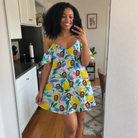 Real-life photo of someone wearing Women's Citron Confetti Custom Face Off-Shoulder Dress — custom faces printed all-over